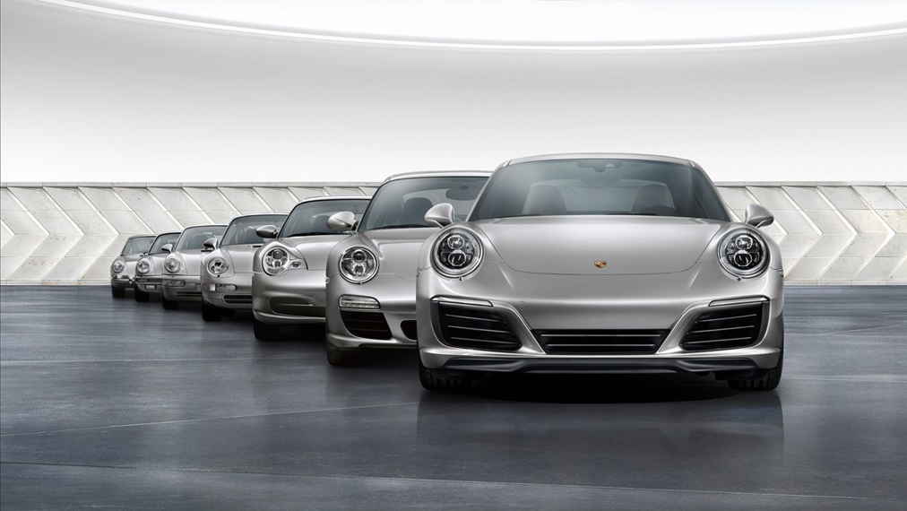 Seven generations of the 911 Carrera parked in front of each other
