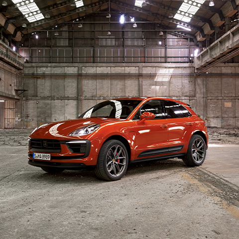 Porsche Macan in a disused factory space