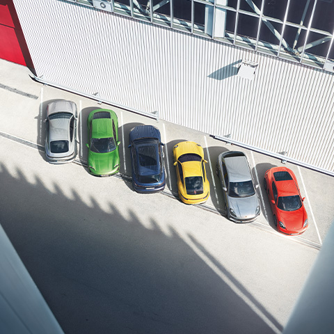 Overhead shot of colourful Porsche model range