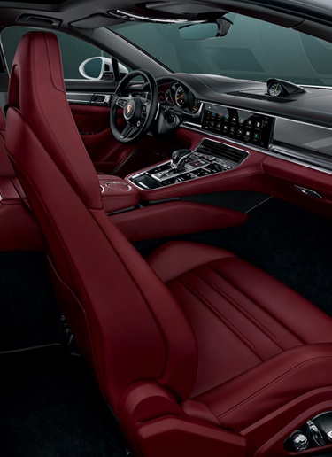 Red leather seats inside a Porsche Panamera 4S E-Hybrid 