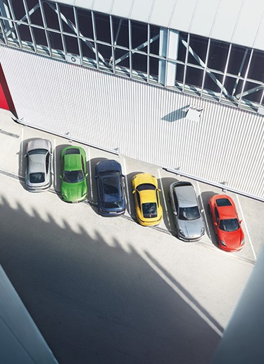 Overhead shot of colourful Porsche model range